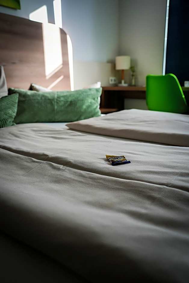 Hotel M24 - Alle Zimmer mit Küchenzeile