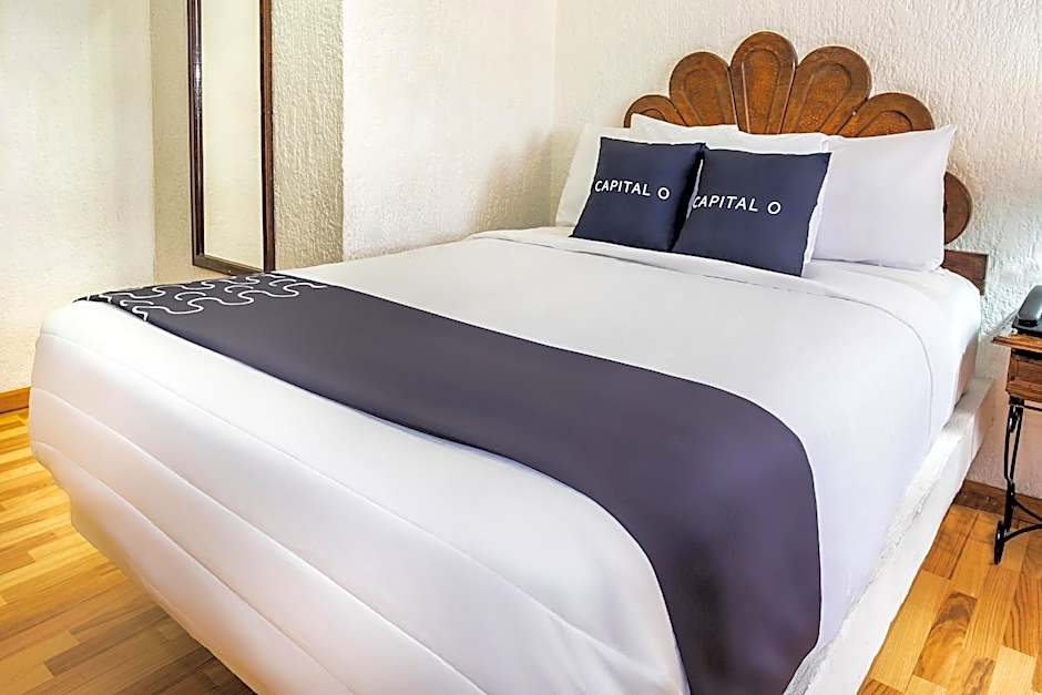 Capital O Hotel Central