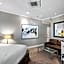 Independence Square 302, Top Floor Stylish Hotel Room with Wet Bar, A/C, in Downtown Aspen