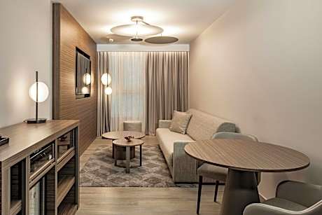 One-Bedroom King Suite with Sofa Bed and City View