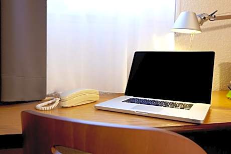 Triple Room with 2 Singles Beds and 1 Junior Bed