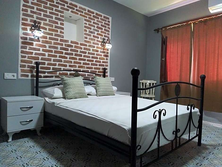 Casa Magnolia Boutique Rooms