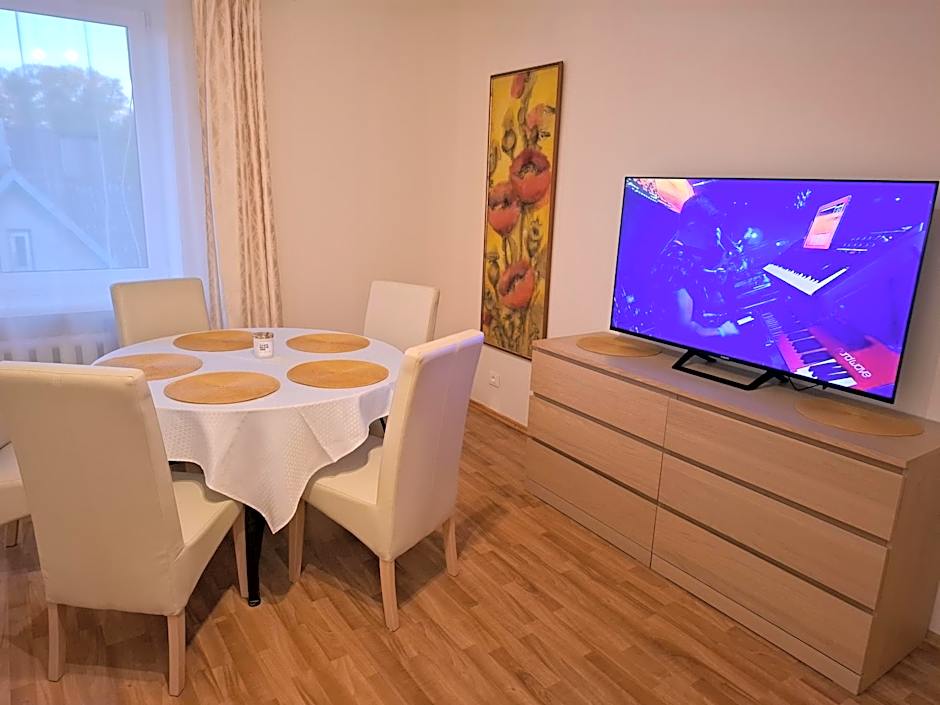 Apartamentai šalia baseino