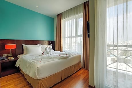 Deluxe Double Room with Balcony and City View
