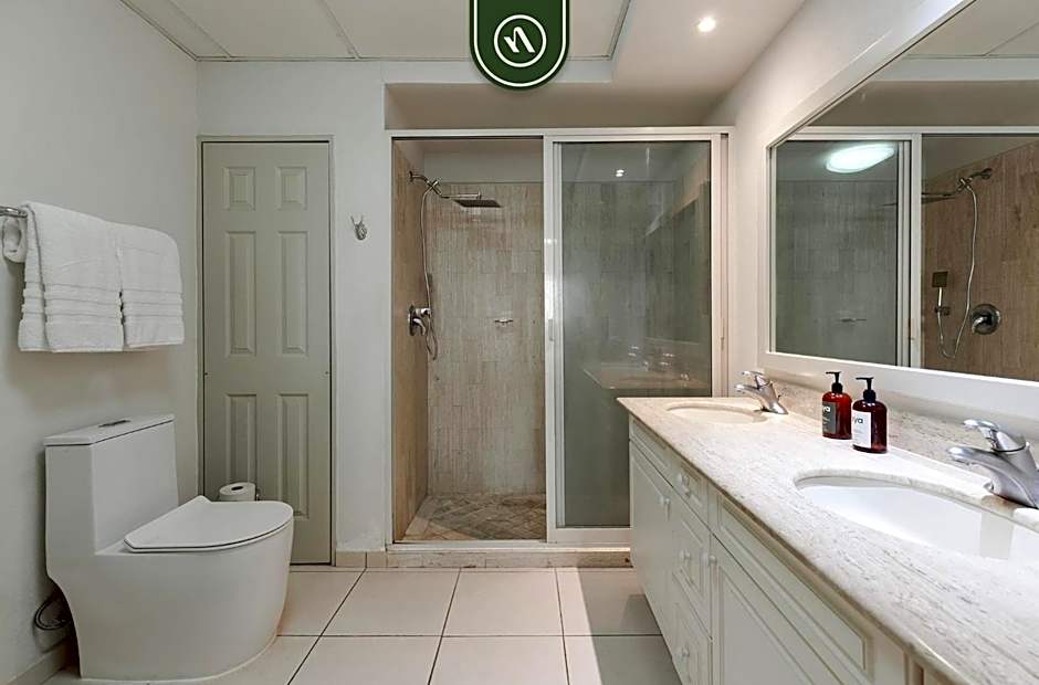 Mexican Styled 2 BR Condo - Beachfront - Pool