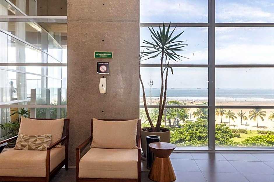 Studio moderno em condomínio de luxo pé na areia