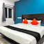 Capital O Che Sigma Hotel