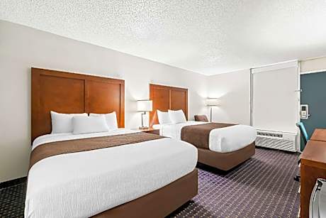 Efficiency Quadruple Room with Two Queen Beds - Non Smoking/Exterior Hall/Pet Friendly