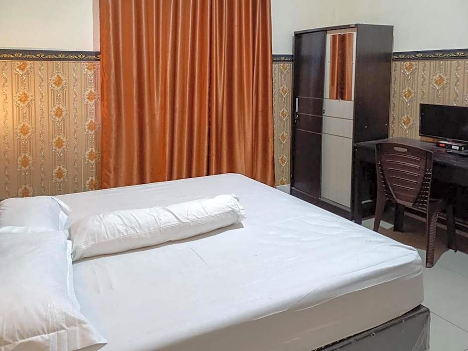 Homestay Singgasana Mitra RedDoorz