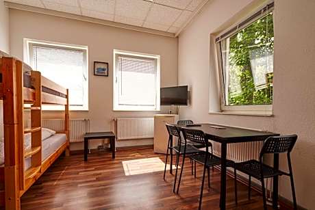 Quadruple Room with Shared Bathroom