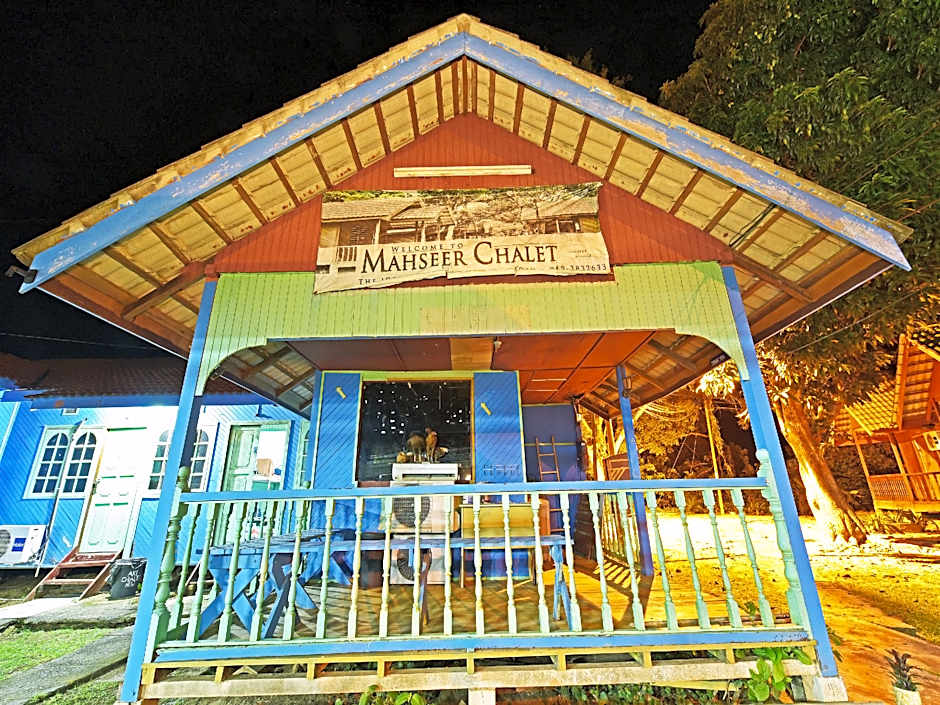Photo 1 of 46 of OYO 90620 Mahseer Chalet