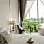 White Wall Riverfront Hotel