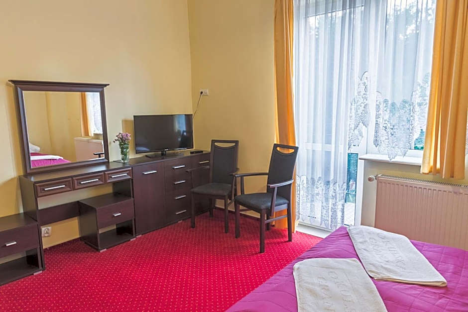 Okulski Grand Rozewie Pokoje i Apartamenty