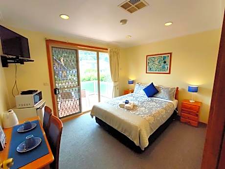 Queen Room with Shared Bathroom