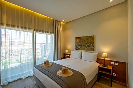 Standard Queen Room with Balcony and Street View - Non-Smoking