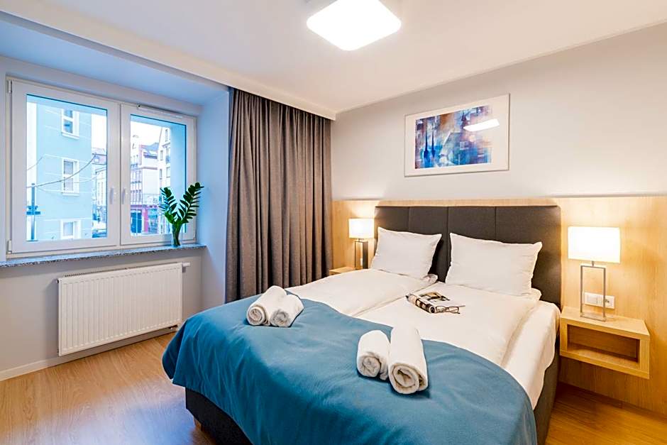 Q17 Apartments Rynek