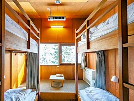Room with Bunk Beds and Shared Bathroom
