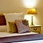 A Propos- Suites et chambres