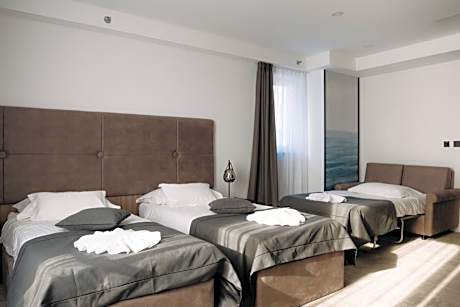 Deluxe Triple Room with Partial Sea View