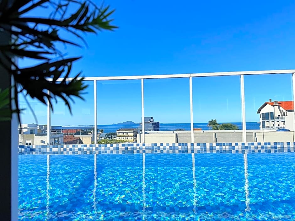 Sol e praia c/ piscina em apto iluminado c/conforto