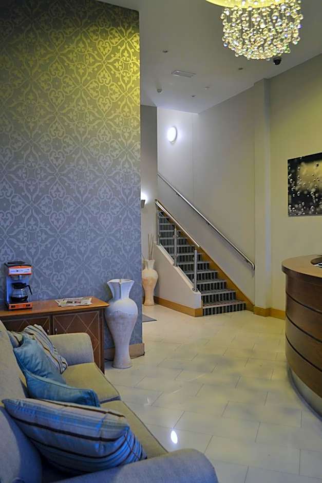 Carrick Plaza Suites and Apartments