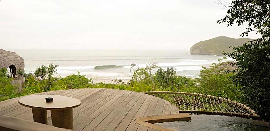 Kini Resort - Oceanfront Bamboo Eco Lodges