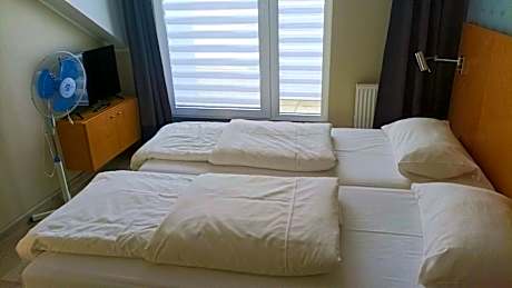 Two-Bedroom Apartment with Balcony - right next to the hotel