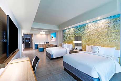 Executive Suite, 2 Queen, Sofa bed, Pool view, Balcony