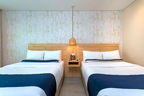 room garden view two queen beds