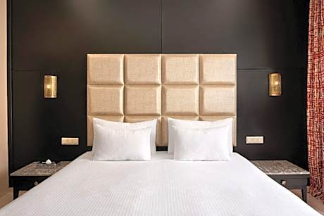 Deluxe Double Room with Two Sofa Beds and Balcony