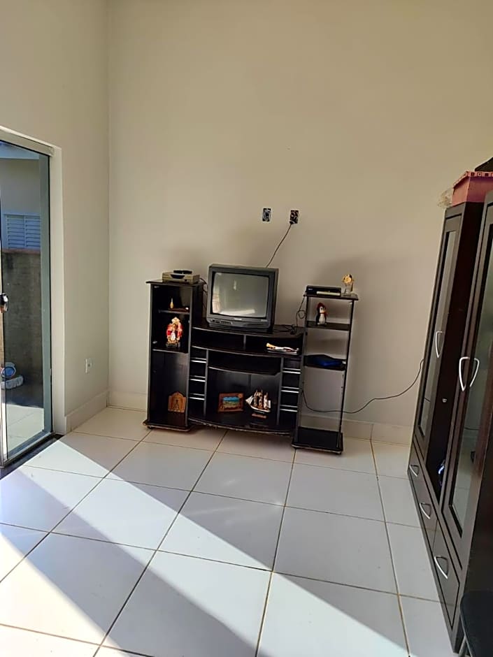 Casa espaçosa em frente à pracinha