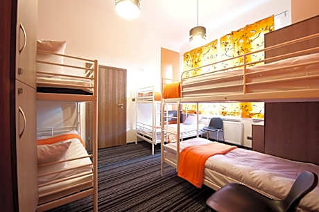 Economy six-bed room with private bathroom