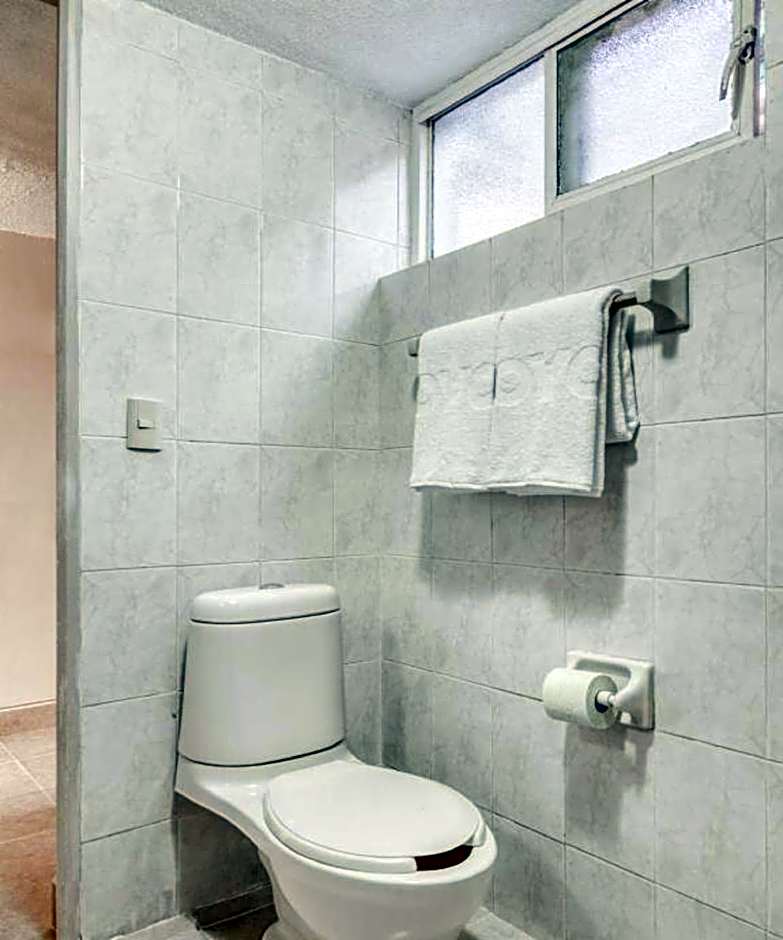 Capital O Hotel La Siesta