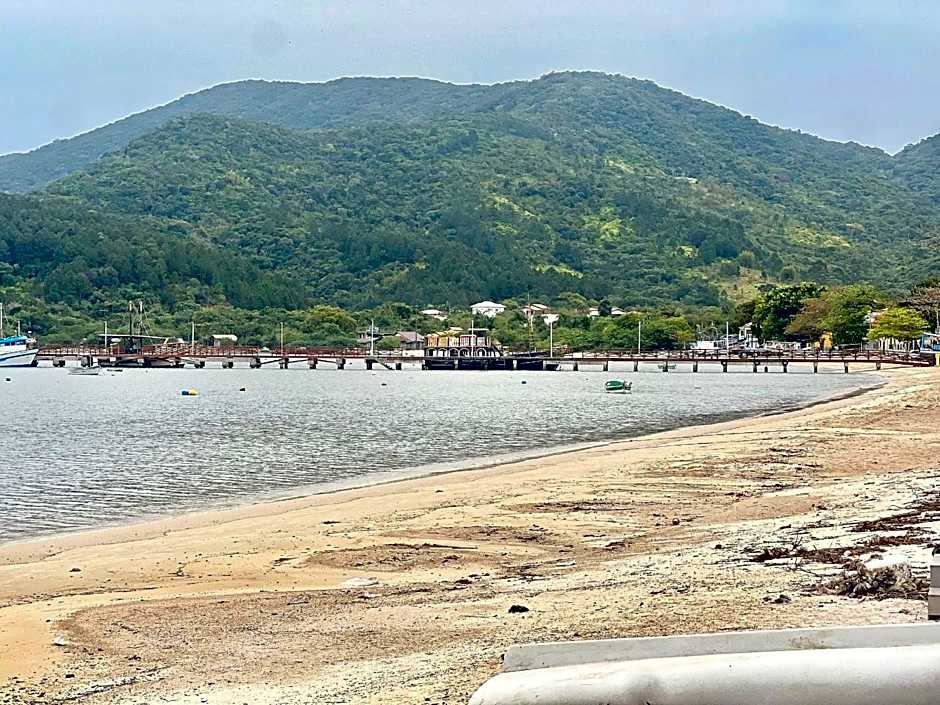 Pé na areia! Aconchegante casa frente Mar! CO02I