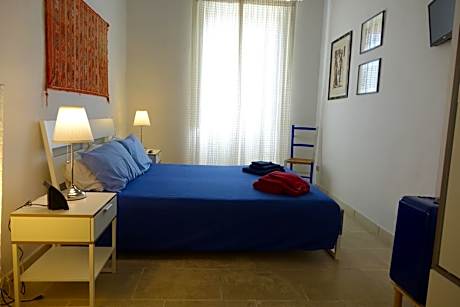 Queen Room with Shared Bathroom