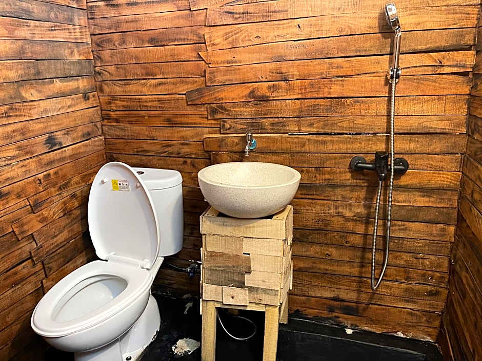 Triangular house and hot spring