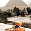Turquoise Pyramids & Grand Egyptian museum view Hotel