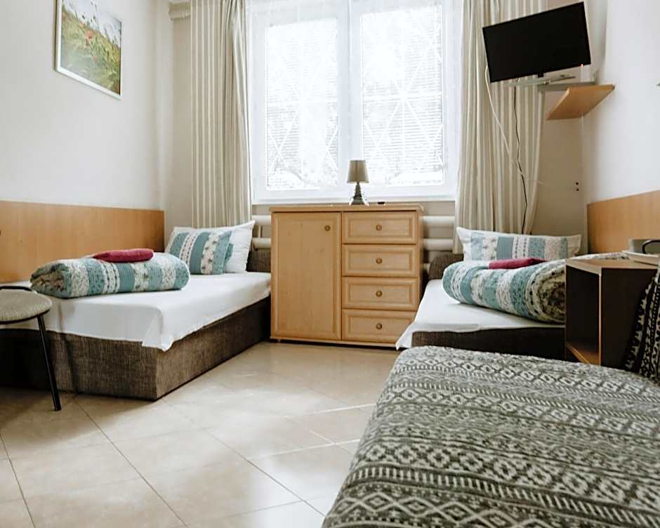 Photo 1 of 25 of Triple Room with Shared Bathroom