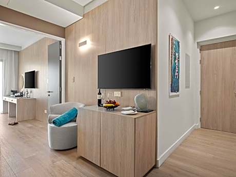 Superior room with double bed, sofa and balcony