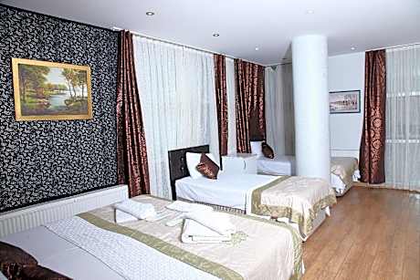 Family Room with 4 Single Beds and Private Bathroom