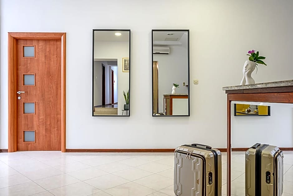 Yellow house with private parking