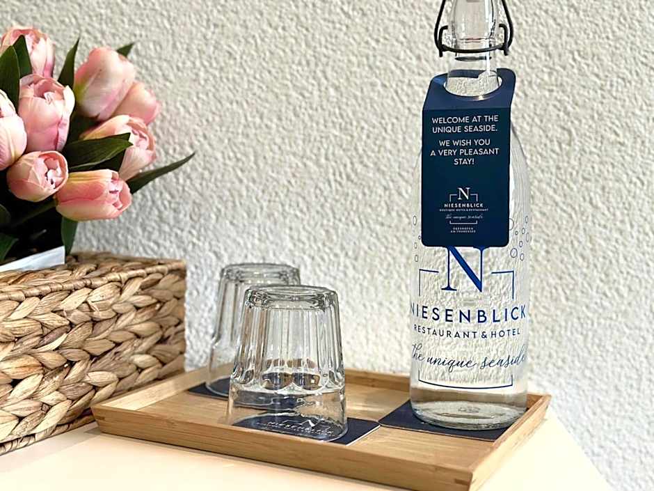 Boutique Hotel Niesenblick - direkt am Thunersee gelegen mit SELF CHECK IN & digitaler Rezeption