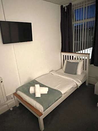 Family room with 1 double and 1 single bed