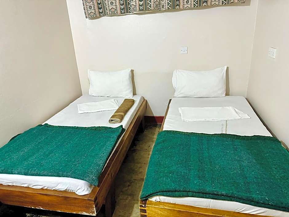 Photo 1 of 4 of Standard Twin Room with Shared Bathroom