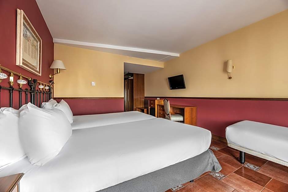 Photo 1 of 4 of Triple Room
