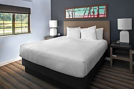 Two-Bedroom King Room with Double Beds and Roll-In Shower - Mobility Accessible