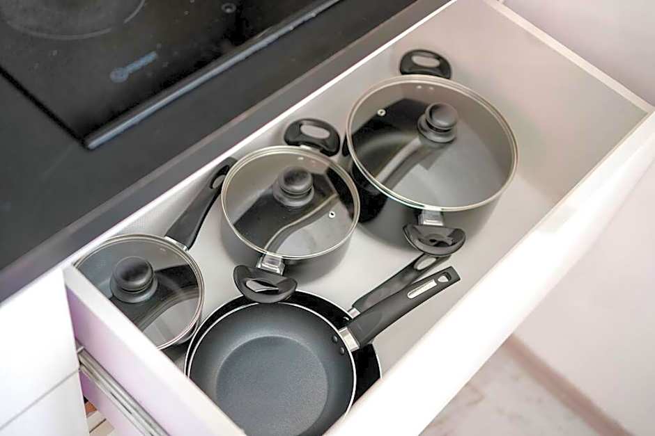 Cozy 1BR apartment by beach - partial ocean view