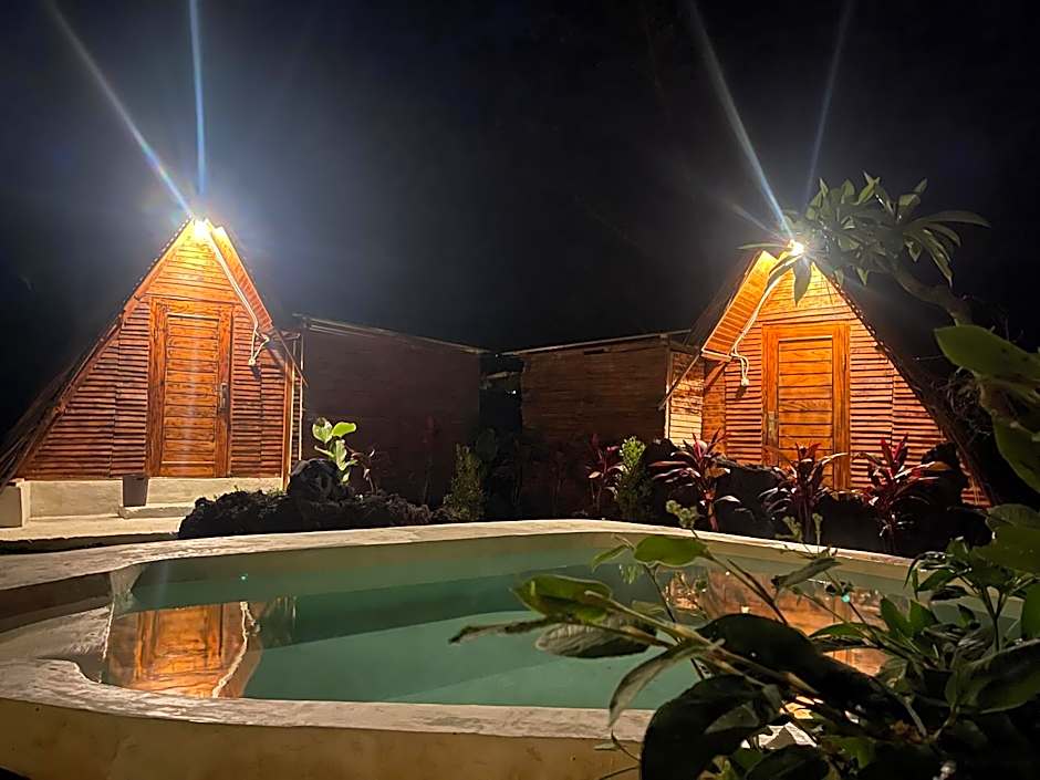 Triangular house and hot spring