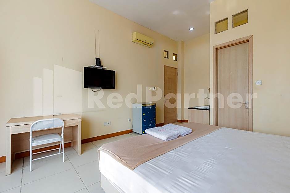 Wisma Anggrek Syariah Mitra Reddoorz