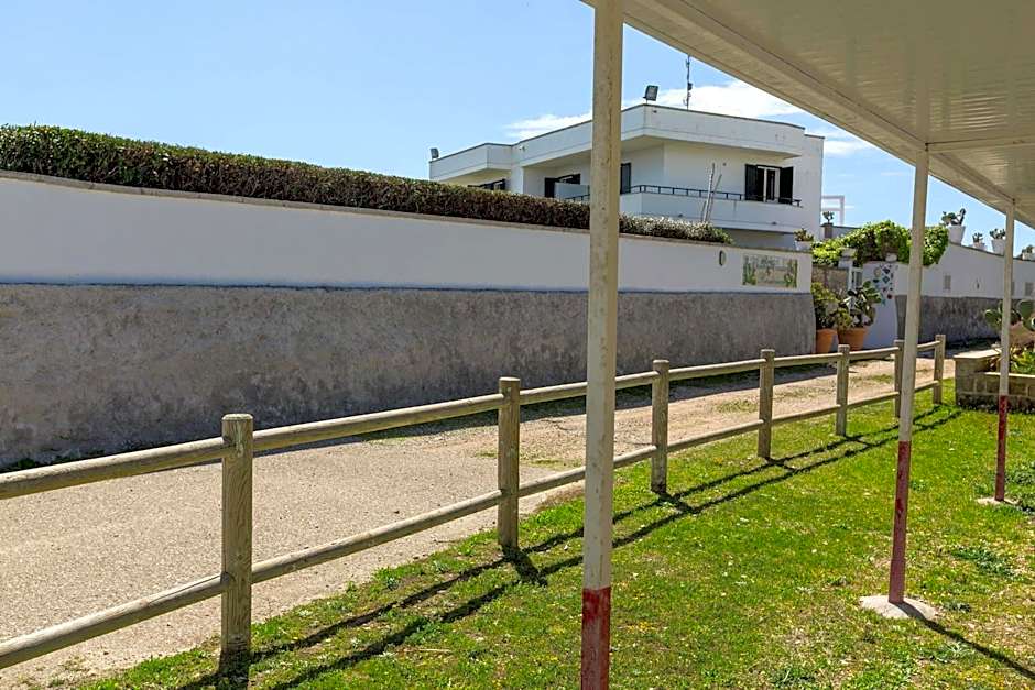 Residence Punta Cassano - In piscina sulla spiaggia di sabbia